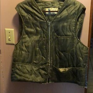 Distressed green vest, zips, pockets.